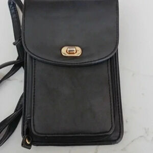 Michael Stevens black vinyl Crossbody bag